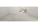 Large bedroom with carpet and access to a private patio at 6906 Woodwind Dr # 12, Sarasota, FL 34231