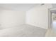 Bright bedroom with carpeted floor and ample space at 6906 Woodwind Dr # 12, Sarasota, FL 34231