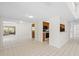 Dining area with mirror and kitchen access at 6906 Woodwind Dr # 12, Sarasota, FL 34231