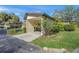 Condo exterior with carport and well maintained lawn at 6906 Woodwind Dr # 12, Sarasota, FL 34231