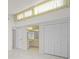 Main bedroom with lots of natural light and private patio at 6906 Woodwind Dr # 12, Sarasota, FL 34231
