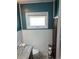 Clean bathroom with white tile, granite vanity, and linen storage at 782 Londra Dr, Venice, FL 34285
