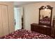 Bedroom with dresser, mirror and closet at 782 Londra Dr, Venice, FL 34285