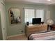 Bedroom with large mirror and dresser at 782 Londra Dr, Venice, FL 34285