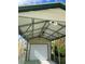 Interior view of carport showing garage door and lighting at 782 Londra Dr, Venice, FL 34285