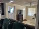 Cozy living room featuring a fireplace and comfy seating at 782 Londra Dr, Venice, FL 34285
