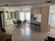 Open floor plan showing kitchen, dining, and living areas at 782 Londra Dr, Venice, FL 34285