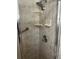 Clean shower with tiled walls and built-in shelves at 782 Londra Dr, Venice, FL 34285