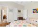 Bedroom has 2 twin beds, wood floors and a trunk at the end of the bed at 793 Vanderbilt Dr, Nokomis, FL 34275