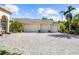 Three-car garage with paver driveway at 793 Vanderbilt Dr, Nokomis, FL 34275