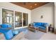 Relaxing outdoor patio with comfortable seating and a view of the beautifully landscaped backyard at 793 Vanderbilt Dr, Nokomis, FL 34275