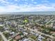 Wide aerial showcasing the home's neighborhood and coastal setting at 842 Nokomis S Ave, Venice, FL 34285