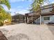 Elevated deck overlooks a gravel backyard at 842 Nokomis S Ave, Venice, FL 34285