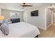Large bedroom with king bed, dresser, and TV at 842 Nokomis S Ave, Venice, FL 34285