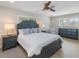 Spacious Primary bedroom with king bed and dresser at 842 Nokomis S Ave, Venice, FL 34285