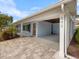 Newly renovated home with a covered carport and a beautifully landscaped front yard at 842 Nokomis S Ave, Venice, FL 34285