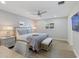 Main bedroom with a king-size bed and built-in workspace at 842 Nokomis S Ave, Venice, FL 34285