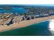 Wide aerial view of coastline with buildings and marina at 1200 Tarpon Center Dr # 204, Venice, FL 34285