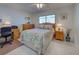 Bedroom with workspace and ocean view at 1200 Tarpon Center Dr # 204, Venice, FL 34285