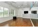 Exercise room with hardwood floors and mirrors at 12664 Sagewood Dr, Venice, FL 34293