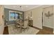 Elegant dining room showcasing a wood table and neutral color palette at 13097 Rinella St, Venice, FL 34293