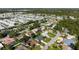 Aerial view of the home and surrounding neighborhood at 1333 Whispering Ln, Venice, FL 34285