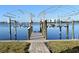 Private dock with two boat lifts and covered structure at 1444 Lemon Bay Dr, Englewood, FL 34223