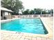 Refreshing community swimming pool with a spacious deck, ideal for summer enjoyment at 145 Jose Gaspar Dr # 145, Englewood, FL 34223