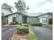 Inviting exterior of a single-story home with a landscaped yard and private driveway at 145 Jose Gaspar Dr # 145, Englewood, FL 34223