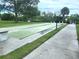 Well-maintained shuffleboard courts provide a recreational space for residents at 145 Jose Gaspar Dr # 145, Englewood, FL 34223