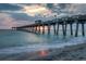 Scenic fishing pier at sunset over the ocean at 1716 Sklar Ct, Venice, FL 34293