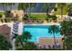 Community pool and spa area with canal views at 2078 Oakridge Cir # A7, Venice, FL 34293