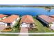 Aerial view of single-Gathering home with lake access and community view at 24176 Spartina Dr, Venice, FL 34293