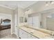 Spacious bathroom with double vanity and granite countertop at 24176 Spartina Dr, Venice, FL 34293