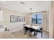 Dining area with light beige walls and lake view at 24176 Spartina Dr, Venice, FL 34293