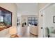 Bright and spacious entryway with views into living room and lake at 24176 Spartina Dr, Venice, FL 34293