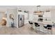 Modern kitchen with stainless steel appliances and granite countertops at 24176 Spartina Dr, Venice, FL 34293