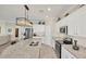 Modern kitchen with stainless steel appliances and granite countertops at 24176 Spartina Dr, Venice, FL 34293