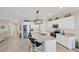Modern kitchen with stainless steel appliances and granite countertops at 24176 Spartina Dr, Venice, FL 34293