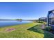 Scenic view of a peaceful lake and lush green landscape at 24176 Spartina Dr, Venice, FL 34293