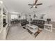 Bright and airy living area with access to dining and entry areas at 2480 Soprano Ln, North Port, FL 34286