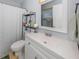 Clean bathroom with white vanity, shower, and updated fixtures at 3181 Nekoosa St, North Port, FL 34287