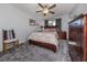 Comfortable bedroom featuring a sizable bed and dark wood dresser at 3181 Nekoosa St, North Port, FL 34287