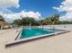 Inviting community swimming pool with lounge chairs at 3181 Nekoosa St, North Port, FL 34287