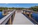 Fishing pier with bench and protective railings at 3181 Nekoosa St, North Port, FL 34287