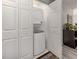 Convenient laundry closet with stacked washer and dryer at 3181 Nekoosa St, North Port, FL 34287