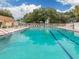 Inviting community pool with lounge chairs at 3181 Nekoosa St, North Port, FL 34287