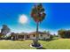 Single story house with palm tree in front yard at 3534 Tundra Rd, Venice, FL 34293