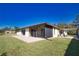 Home exterior showcasing a screened patio and lush lawn at 3534 Tundra Rd, Venice, FL 34293