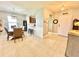 Dining room with a wood table, six chairs, and a view into the kitchen at 3648 Pebble Ter, Punta Gorda, FL 33980